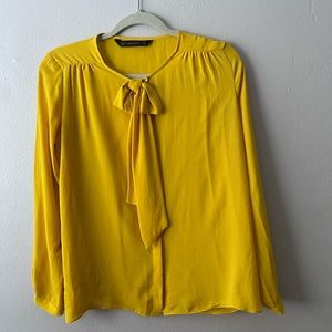 Sea yellow long sleeve shirt.